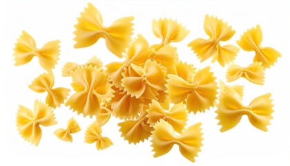 Scattered, uncooked bow-tie pasta pieces on a stark, white backdrop