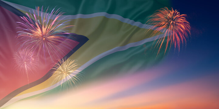 Waving National flags of Guyana In sky with fireworks and text