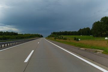 Bad weather, views of the road highway, clouds and darkness.