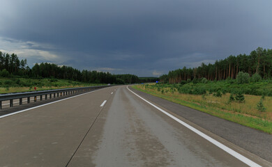 Fototapeta premium Bad weather, views of the road highway, clouds and darkness.