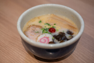 Ramen, a Japanese noodle dish with chashu, a tender braised pork belly as its topping.