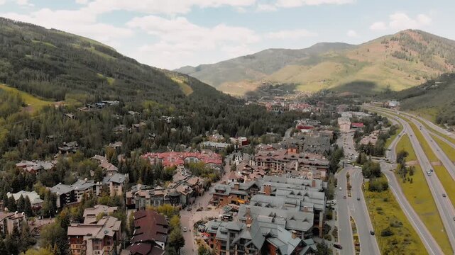 Vail city center and surrounding mountains, Colorado. Aerial view from drone in summer season