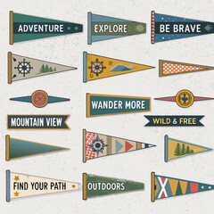 Collection of colorful vintage pennants with inspirational outdoor adventure themes © Shuvra Majumder