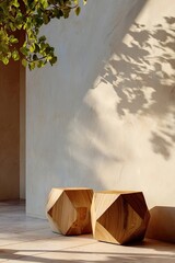 Wooden stools and plant shadow on wall