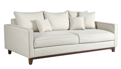 A plush, off-white upholstered sofa with dark wooden legs and multiple throw pillows