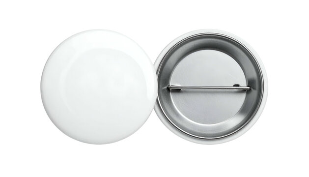 Two white blank round badges, one with pin back exposed, against a black background