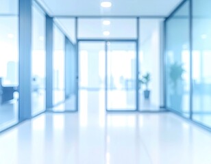 Blurred office hallway, blue-toned, leading toward a bright entryway