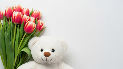 White teddy bear with a bouquet of pink tulips on a white background. Spring gift card.