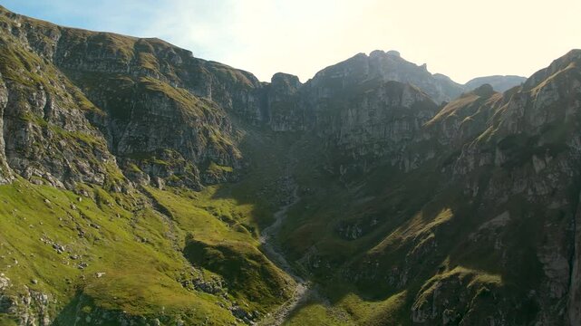 Cinematic 4K Aerial Drone Flight Over Upper Malaiesti Glacial Cirque Towards The Chimneys and Steep Hiking Trail to Omu Peak Bucegi Romania