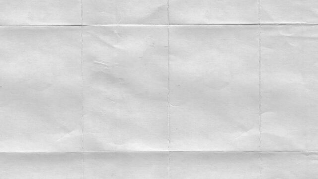 Textured white paper with creases and folds showing a minimalist and abstract aesthetic