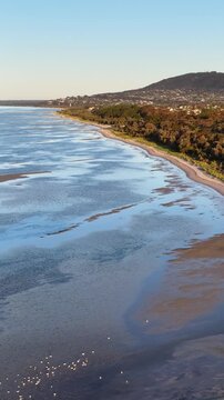 Aerial View of Mornington Peninsula Coastline with Sandbars and Clear Water