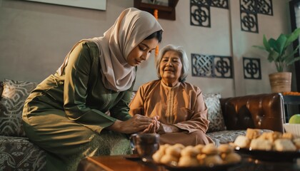 Muslim Granddaughter Respectfully Holds Hand of Smiling Elderly Grandmother during Family Gathering