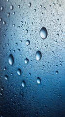 Condensation droplets on chilled glass with seamless backdrop and copy space left