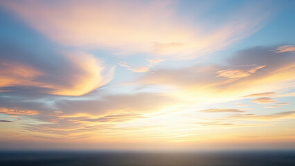 Sunset Sky with Colorful Clouds and Soft Light Over a Blurred Horizon