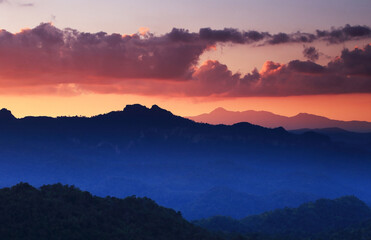 A scenic view of the cool mountain peaks in the western forests of Thailand.