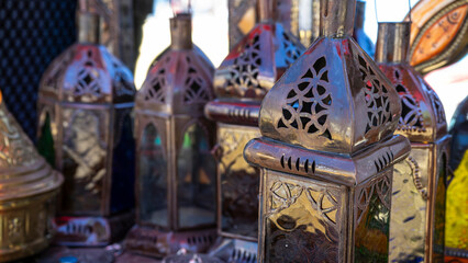 Decorative lanterns with intricate designs and colors.