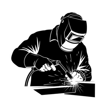 A skilled welder at work focused on precision metal fabrication and joining