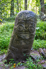 Smiling tiki of Punaei in Hiva Oa, Marquesas Islands, French Polynesia