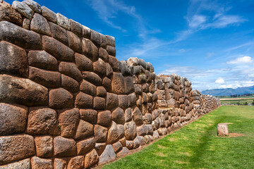 Inca archaeological site of Chinchero with terraces and mountain backdrop