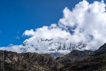 Snow-capped mountains and valley along the Laguna 69 trek in Huaraz, Peru