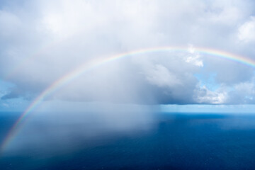 Rainbow over the ocean near Tahaa island, French Polynesia