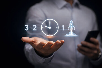 Businessman holding hand with countdown and rocket launch icon