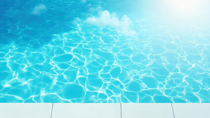 Clear blue swimming pool water with sunlight reflections and gentle ripples on a sunny day