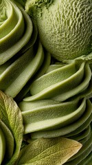 Close-Up of Matcha Green Tea Ice Cream Texture.Macro photography of swirled matcha green tea ice cream or soft serve with creamy texture, smooth spirals, and natural green leaf decoration.