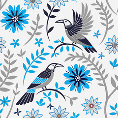 Obraz premium Stylish bird and flower pattern design in blue tones on white background for textile and decor