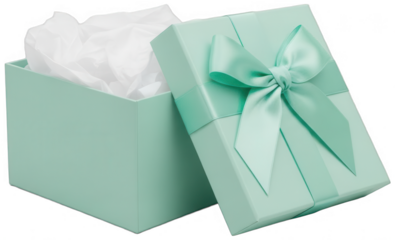 Opened mint green gift box with white tissue paper and satin bow