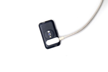 smart watch being charged, isolated on white background