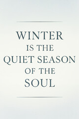Fototapeta premium Winter quote about quiet season of the soul in gray text
