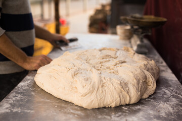 mass of yeast dough in the bakery