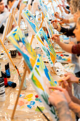 Women enjoying a creative sip and paint event