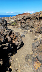 Volcanic landscape path leading to Meridiano Zero Monument, El Pinar, Island El Hierro, Canary...