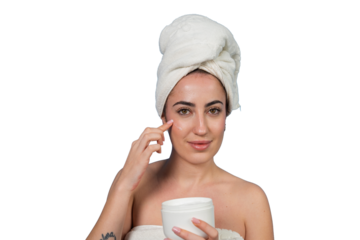 Woman applying cream for a healthy skincare routine