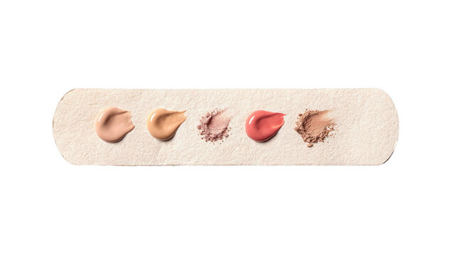 Single cosmetic patch test strip with makeup dabs on white background demonstrating a home beauty safety routine before full facial application.