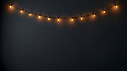 warm string lights on dark background with copy space