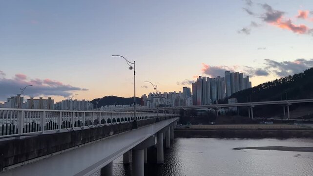 Traffic on a Bridge During Sunset with Apartment Buildings in the Background in South Korea