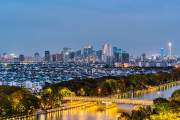 Skyline of the Old Canal Nanyuan Bridge and Gate to the East in Suzhou, Jiangsu, China