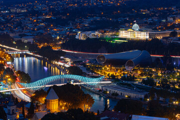 Tbilisi Night Cityscape With Peace Bridge And Rike Park Illumination