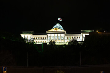 Illuminated Presidential Palace With Glass Dome In Tbilisi At Night