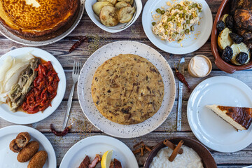 Spanish food spread with tortilla and diverse dishes