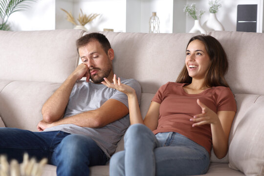 Bored man listening to talk his partner or friend