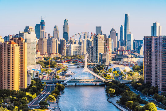High angle view of the city scenery and Tianjin Eye Ferris Wheel on the Haihe River in Tianjin, China.