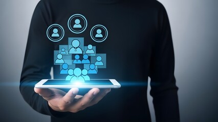 A person holding a tablet with social media and people icons