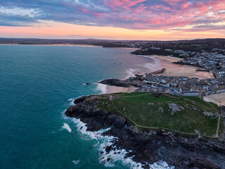 Vibrant twilight elevated capture of St Ives town, bay and beaches in Cornwall, UK