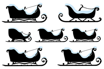 A collection of black silhouettes of sleighs on a white background