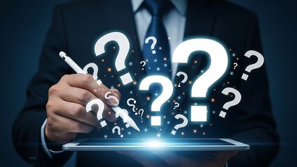 Naklejka premium Person in suit holding stylus over tablet with floating question marks