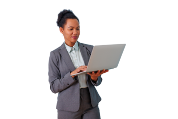 Professional black woman in business suit using laptop, working on a project, focused, digital communication concept